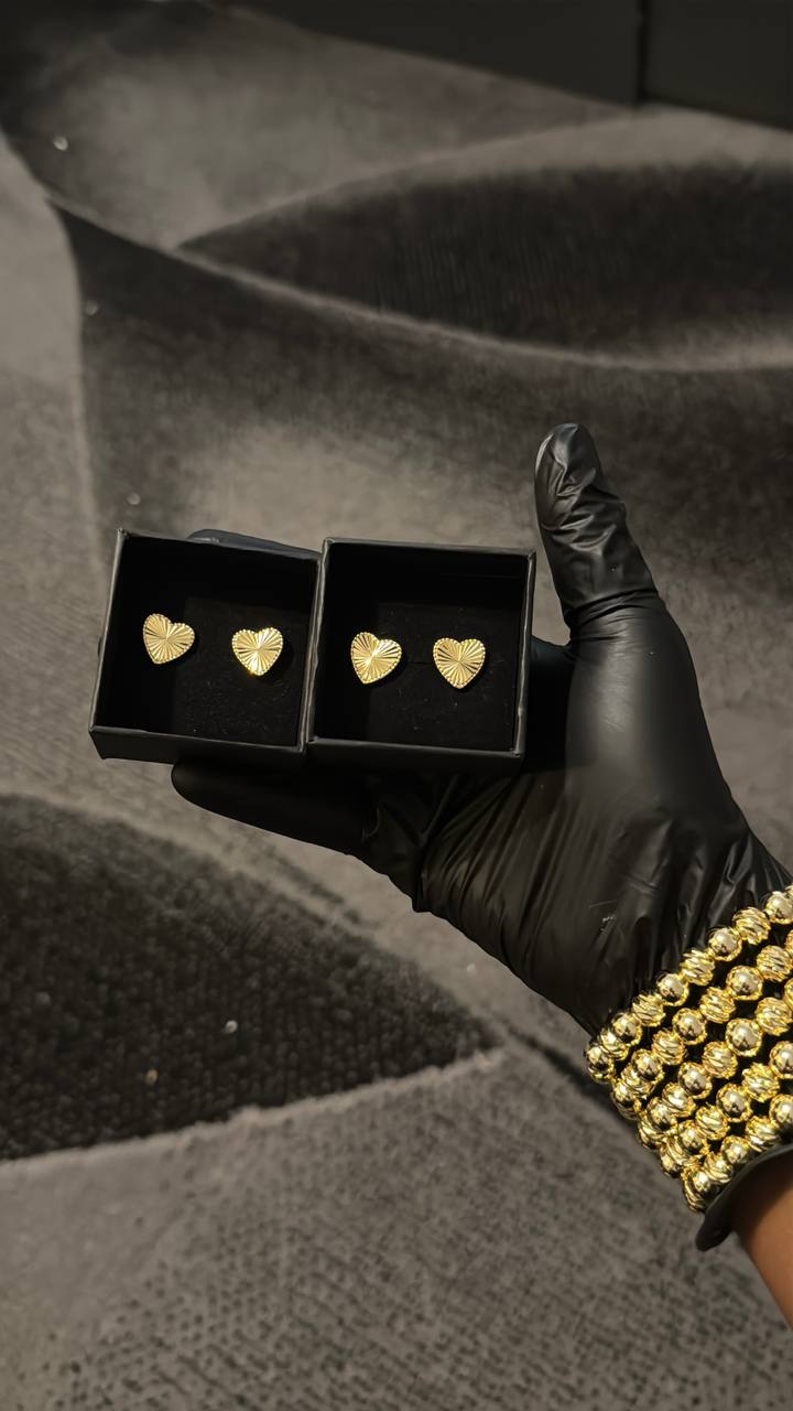 Radiant Heart Gold Stud Earrings